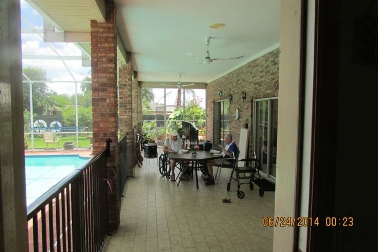 Assisted living patio and pool view at Summerhaven